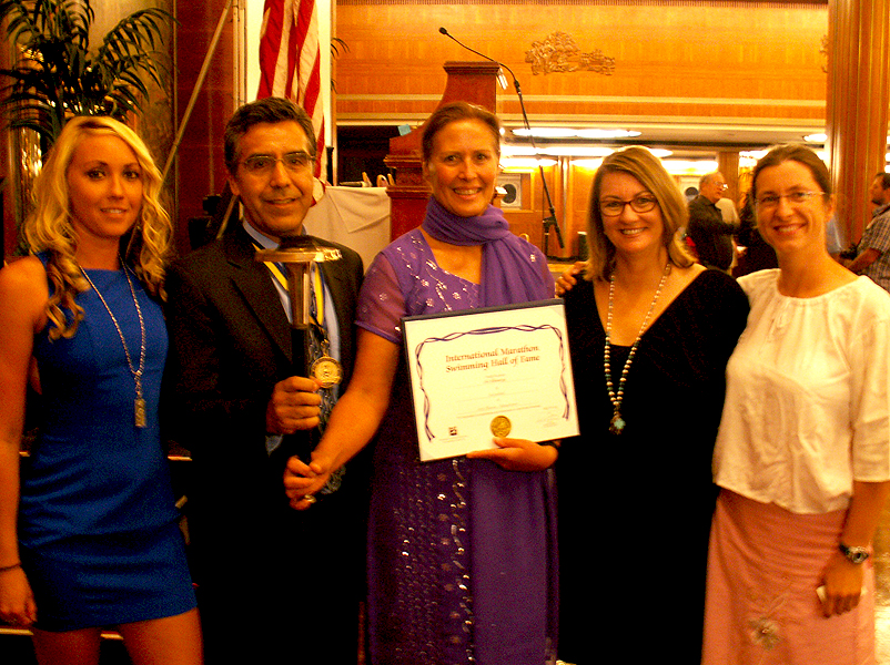 Torch Bearer Award presented to Steven Munatones, Vice-President of the IMSHOF Torchbearer-award-team.jpg